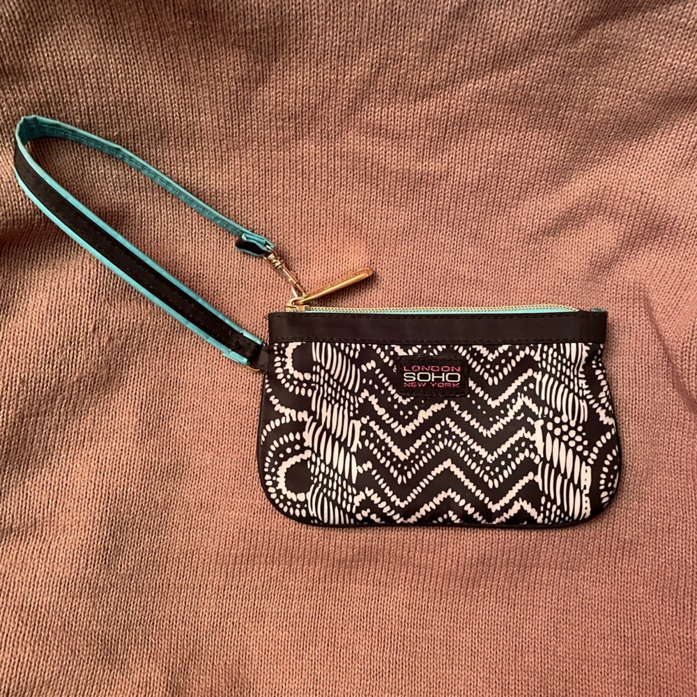 London SOHO New York Y2K Black & White Print 4X7" Wristlet with teal lining.